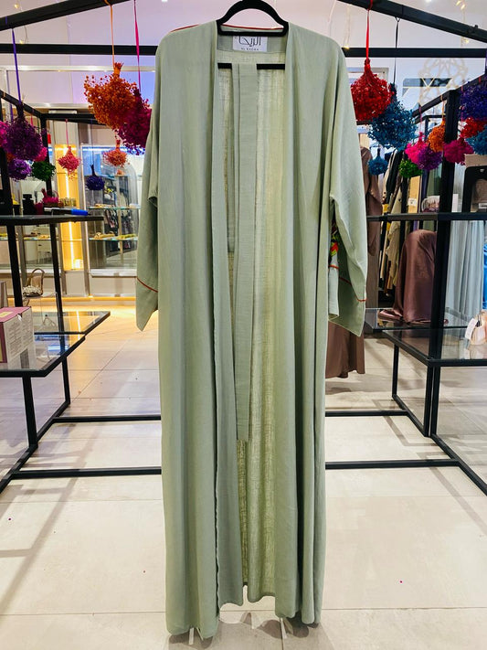 Mint linen abaya with embroidered details