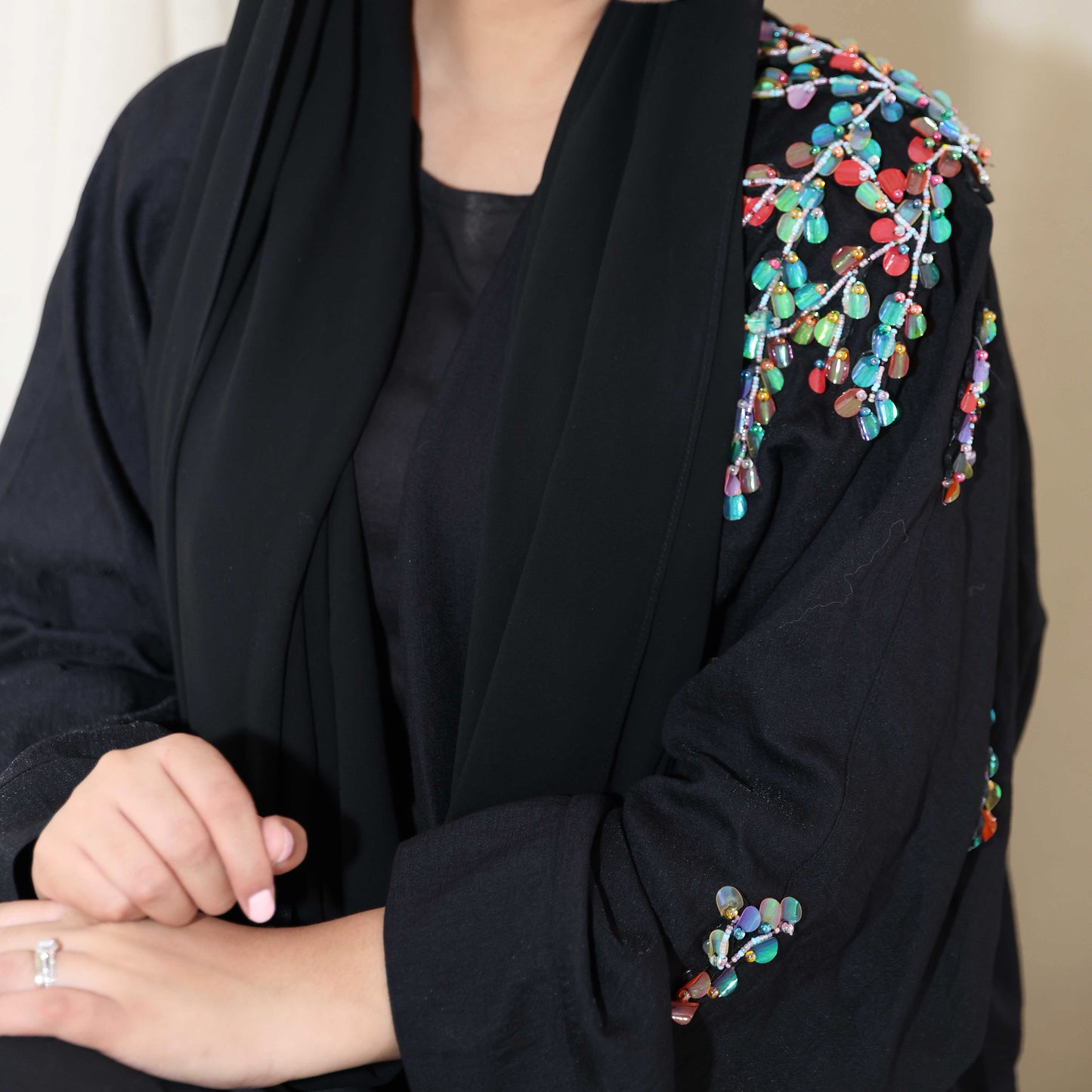 Black abaya with multicoloured beadwork