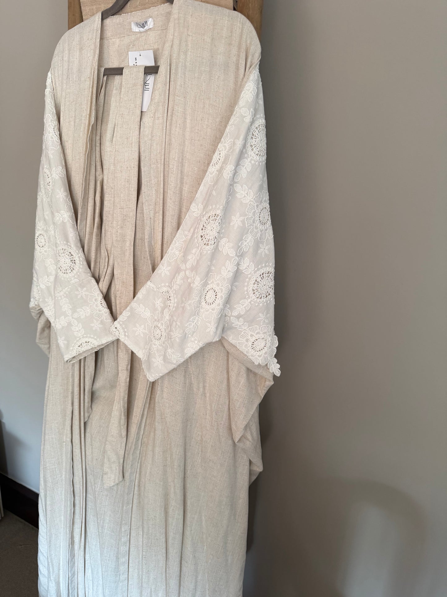 Beige linen abaya with details