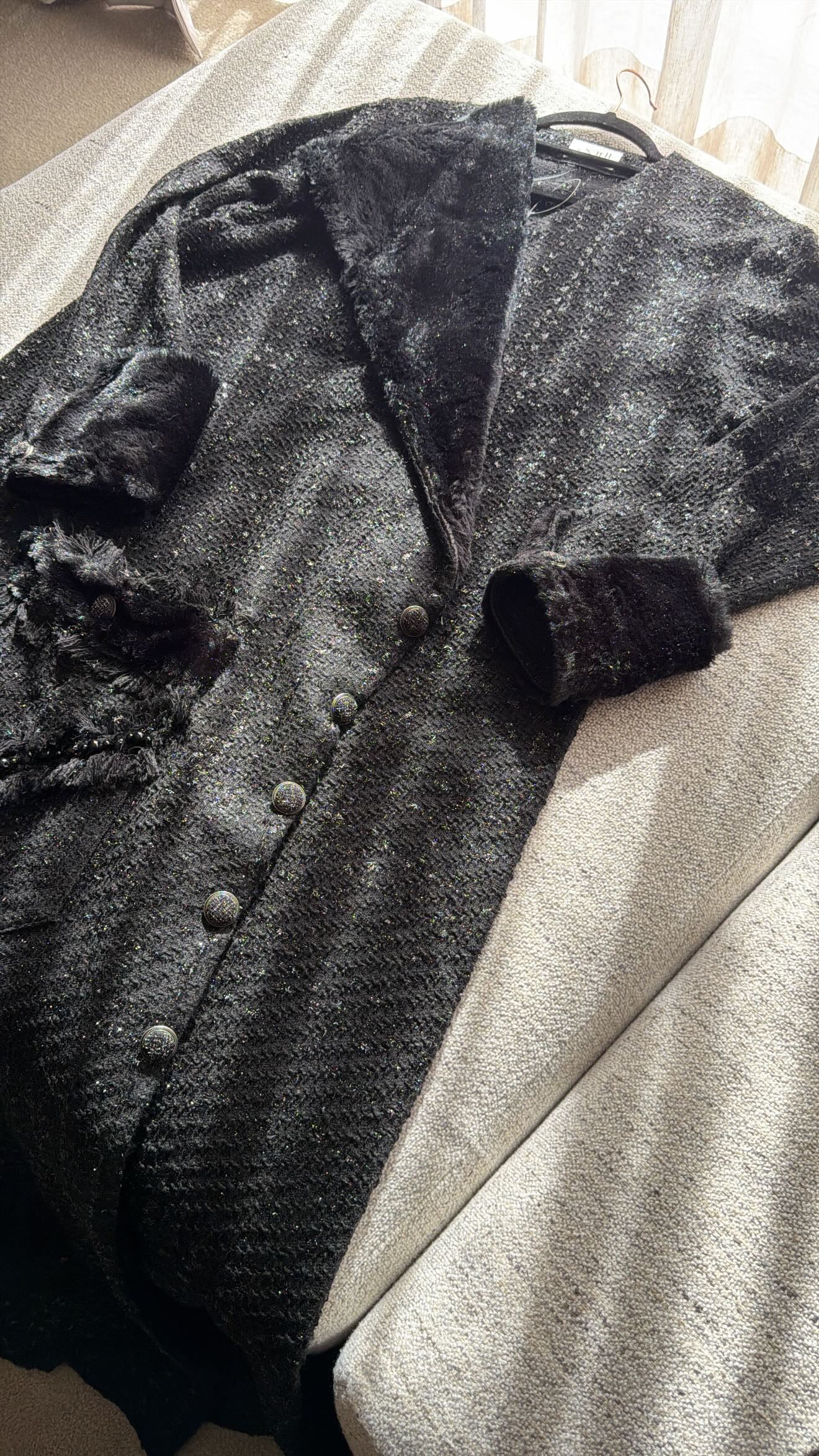 Maxi black tweed coat with fur and pocket details